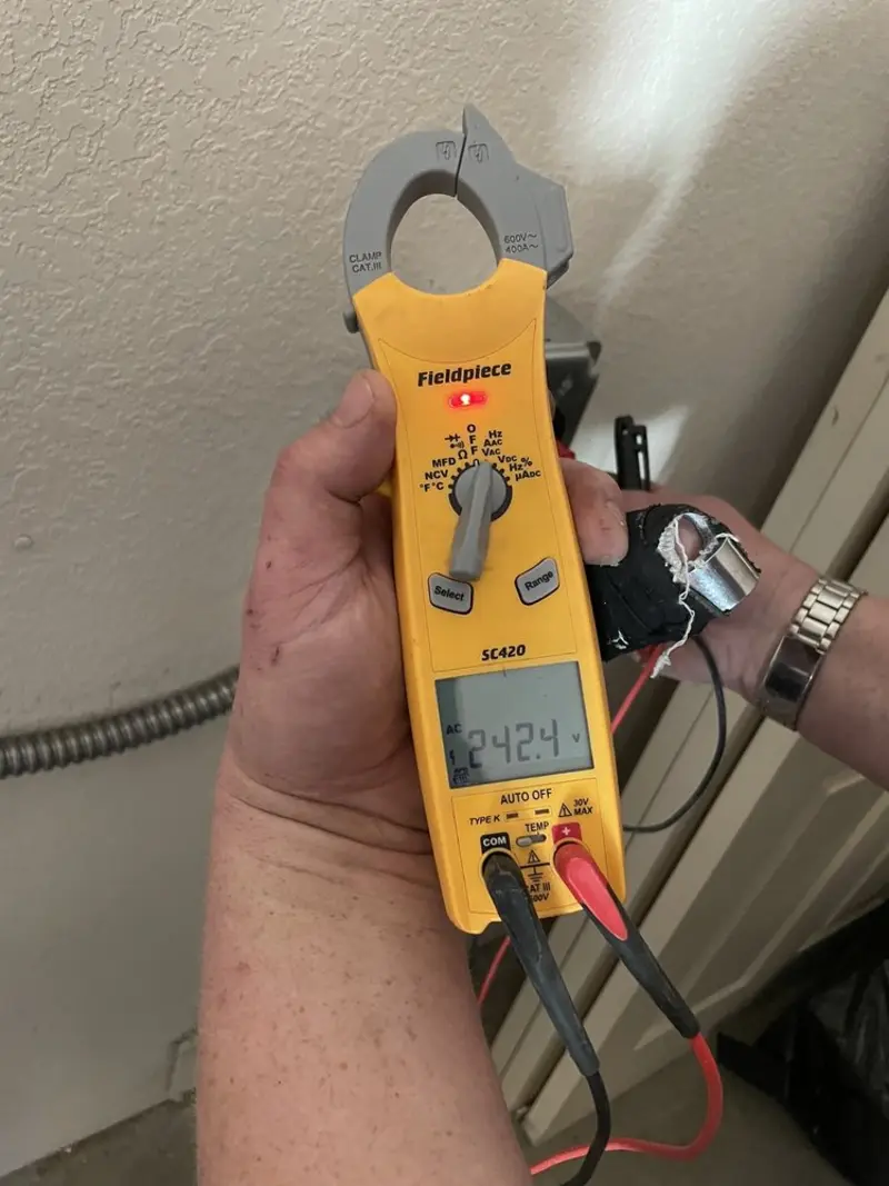 Voltage testing with clamp meter during Circuit Breaker Repair in Yonkers